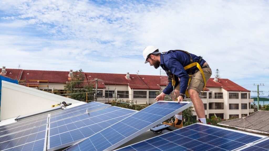 Man installing solar
